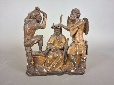 a statue of a man and a woman sitting on a bench