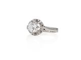 a diamond single - stone ring set in 18k white gold