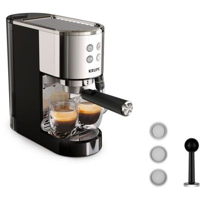 an image of a coffee machine with a cup of espressor in front of it