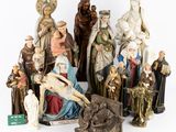 several figurines of different sizes and sizes of people