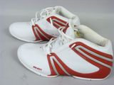 pair of white and red tennis shoes with red stripes on them