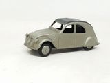 a toy car that is sitting on a white surface