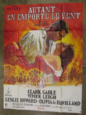 an old movie poster of a man and a woman kissing in front of a fire