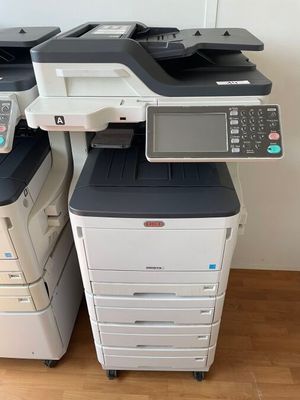 three multi - function printers are stacked on top of each other