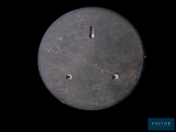 an image of a round metal object with holes in it