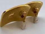 pair of gold plated earrings with pearl drops on them