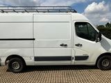 a white van that is parked in a parking lot