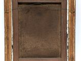 an old picture of a wooden frame hanging on a wall