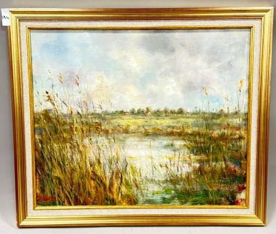 un tableau représentant un paysage avec de l'herbe et de l'eau, dans un cadre doré