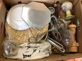 a box full of assorted kitchen items in it