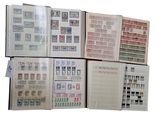 many different types of stamps on the pages of a book