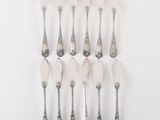 a set of six silverplated serving spoons and a set of six silverplated serving spoons