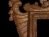 a picture of a gold picture frame with a black background
