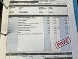 a picture of a pay receipt with a stamp on it