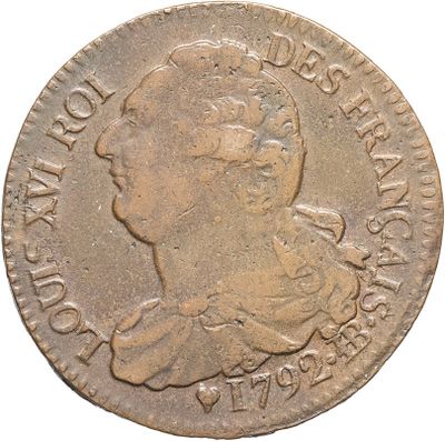 a close up of a coin with a woman ' s face on it