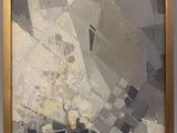 l'image d'un tableau sur le mur d'une pièce