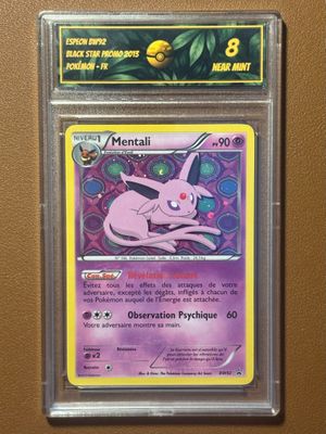 une carte Pokémon sur laquelle figure un Pokémon rose