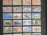a picture of a collection of stamps from around the world