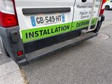 a van that is parked on the side of the street