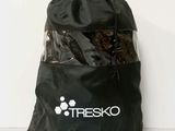 a black bag with a bunch of clothes inside of it