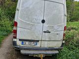 a van that is parked on the side of the road