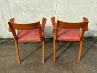 Paire de fauteuils à pieds compas et garniture en skaï rouge… (photo 3)