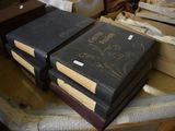 two books sitting on top of each other on a table