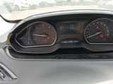 a car dashboard with a speedometer and gauges on it