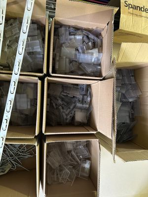 many boxes of assorted electronic components in a room
