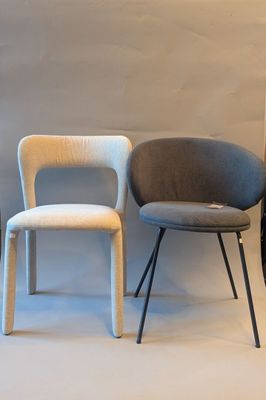 three chairs sitting next to each other in a room