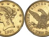 a gold coin with an eagle on the front and a woman ' s head on the back