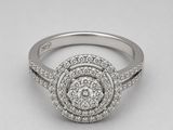a white gold engagement ring with a round diamond center
