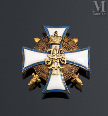 a close up of a cross on a black surface