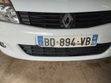 a white car that is parked in a garage