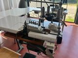 a sewing machine sitting on a table in a room