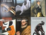four books of drouot and drouot are on a table