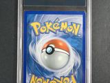 a close up of a card with a pokemon ball on it