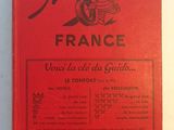 an old red book with a picture of a motorcycle on it