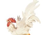 statue of a white rooster with a red beak on a white background