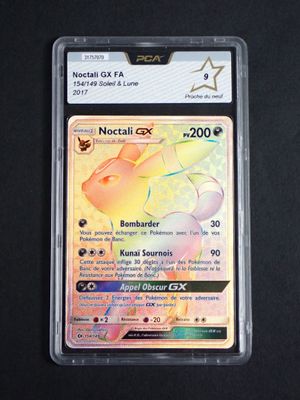 a close up of a pokemon card on a table