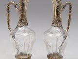 paire de vases en verre plaqué argent, munis d'anses et de poignées