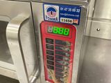 a microwave that has a digital clock on it
