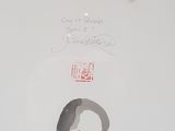 a picture of a painting on the wall of a bathroom