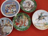four plates on a table with a red table cloth
