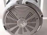 an image of a blower sitting on top of a radiator