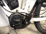 a close up of a motor bike with a speaker on it
