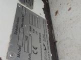 a close up of a piece of metal on the side of a boat