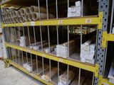 many rolls of paper on the shelves in the warehouse