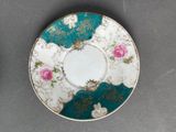 an image of a tea cup and saucer on a table