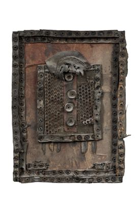 a picture of a metal plaque on a white background